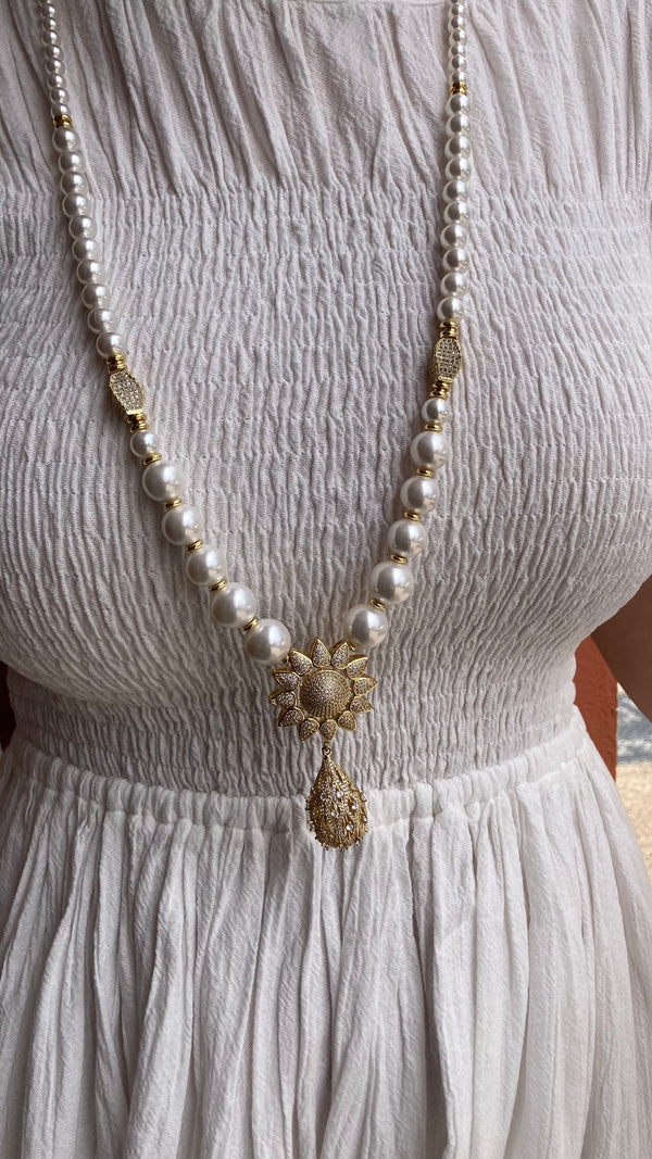 Long Pearl Necklace with Sunflower Accent