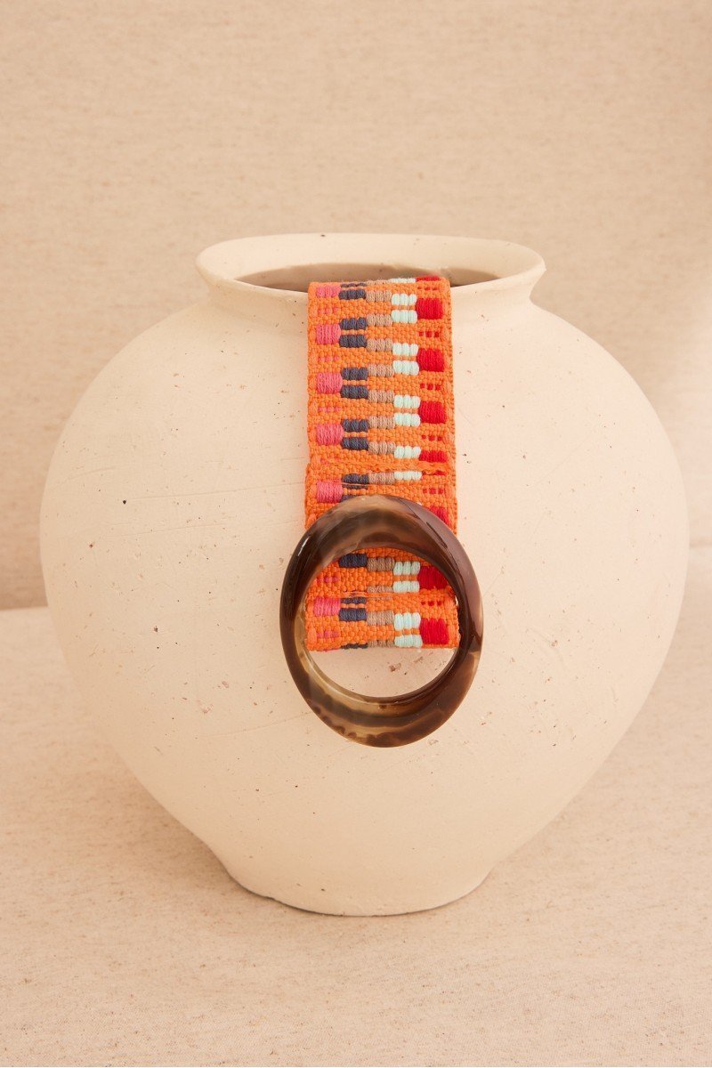Belt with Embroidered Trim and Oval Resin Buckle